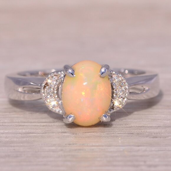 Welo Opal and Natural Diamond Ring in White Gold